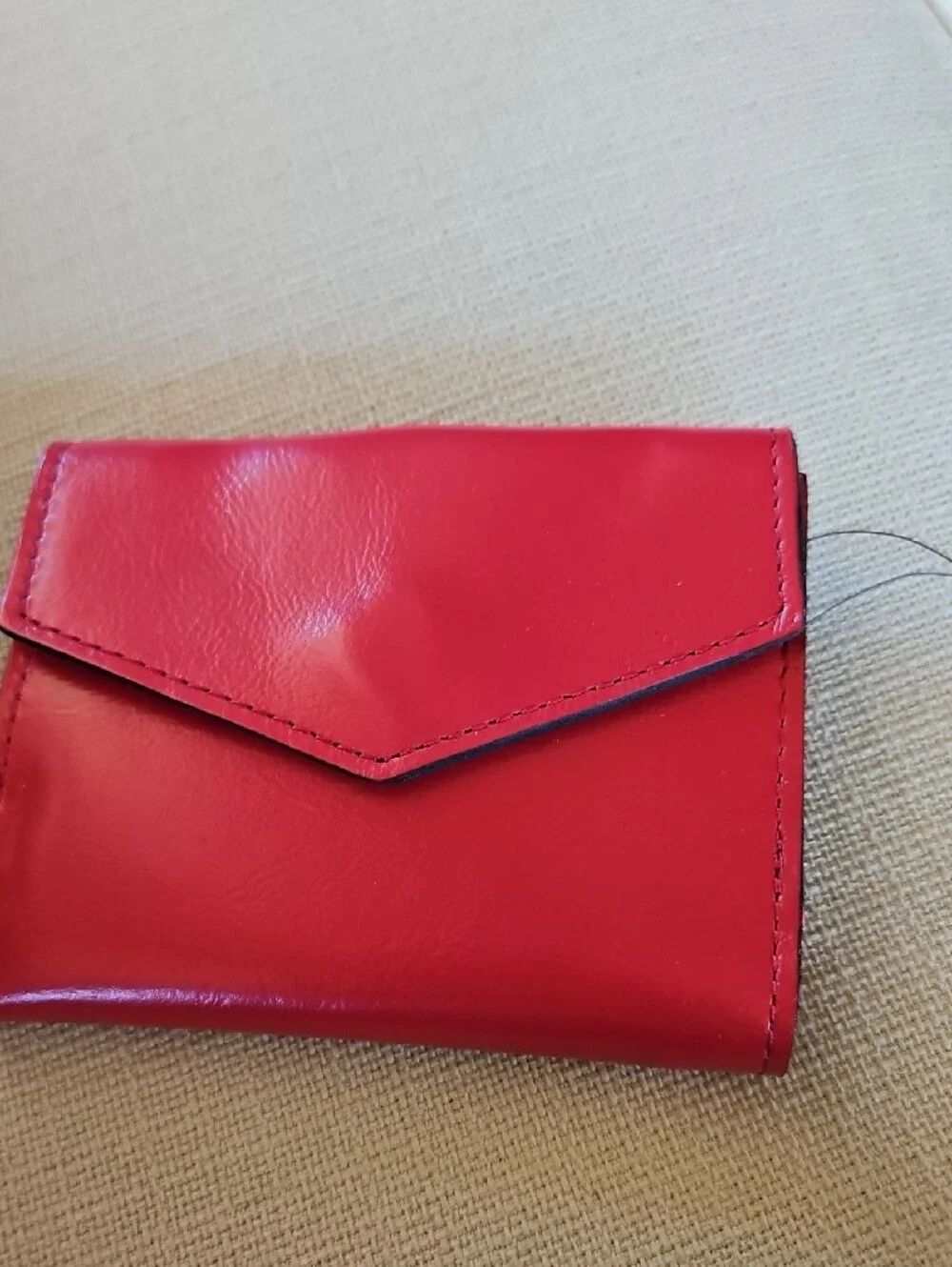 Patricia Nash Strawberry Pink Leather Wallet with Gold Metal Accented Closure.
